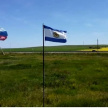Стало известно, откуда появились флаги новых регионов РФ посреди поля в татарстанском селе 